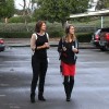 Nicole Capretz, the director of Climate Action Campaign, shows KPBS reporter Claire Trageser the solar trees in the parking lot of Kyocera, Jan. 4, 2016.